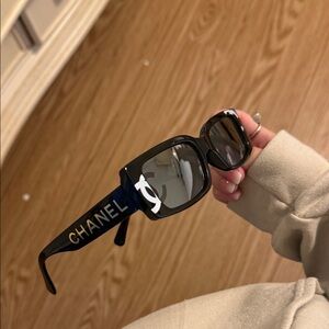 CHANEL Black Sunglasses with Gold Logo
